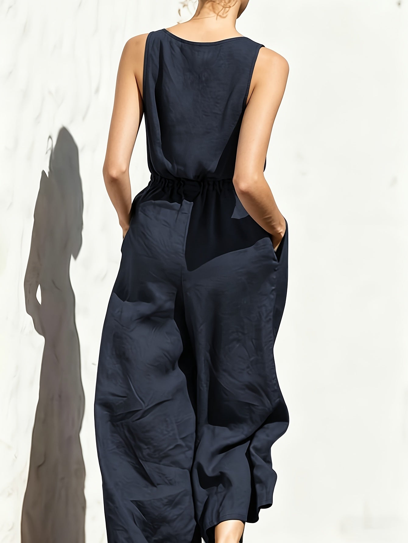 Effortless Navy Blue Linen Wide Leg Jumpsuit for Women with V Neck Sleeveless Button Front Relaxed Style