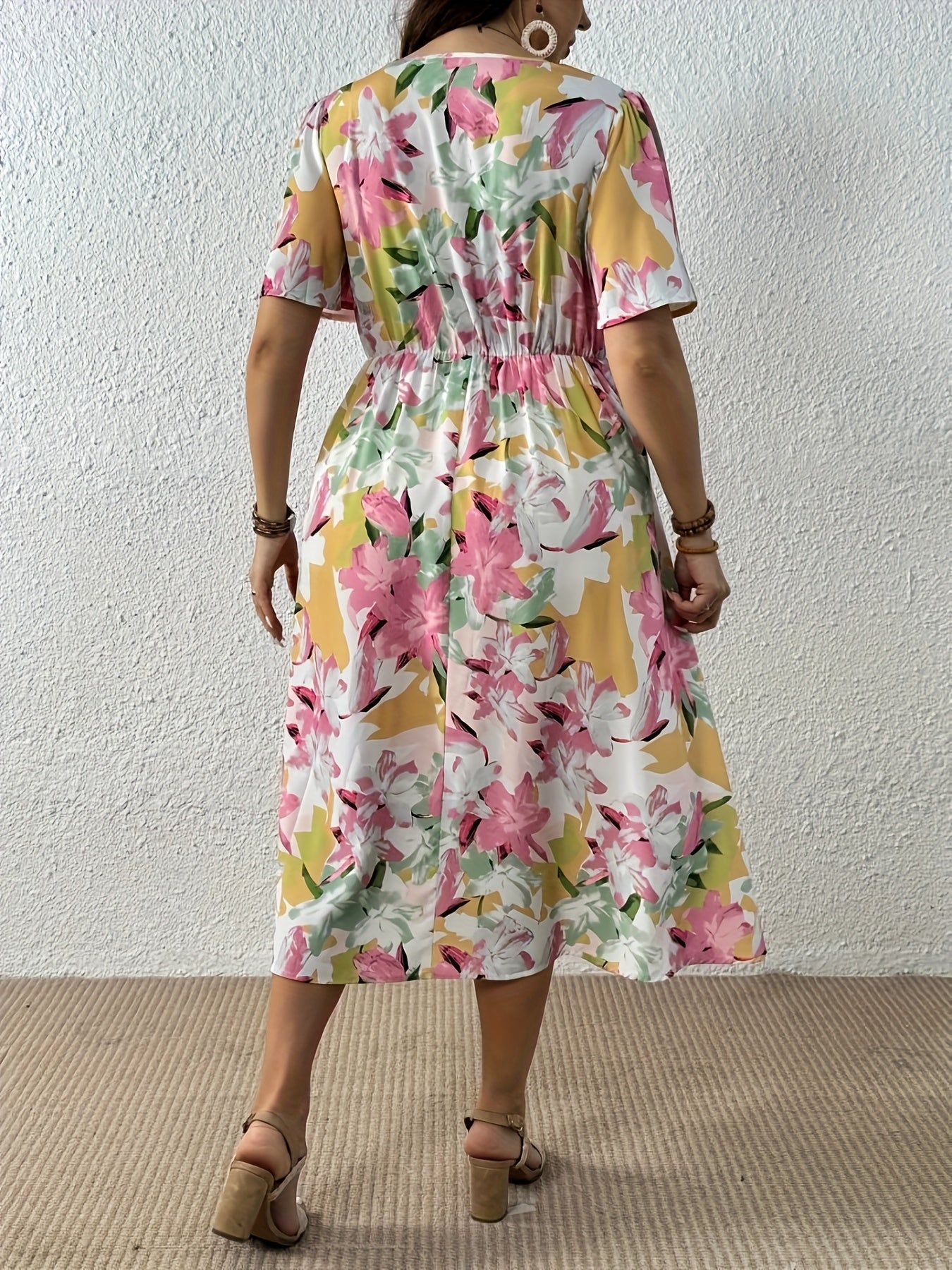 Elegant Leopard Print Midi Dress for Women with V Neck Flutter Sleeve Twist Front Flowing Style
