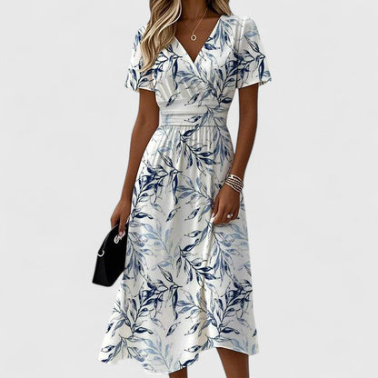 Effortless White Floral Midi Dress for Women with V Neck Flutter Sleeve Wrap Flowing Style