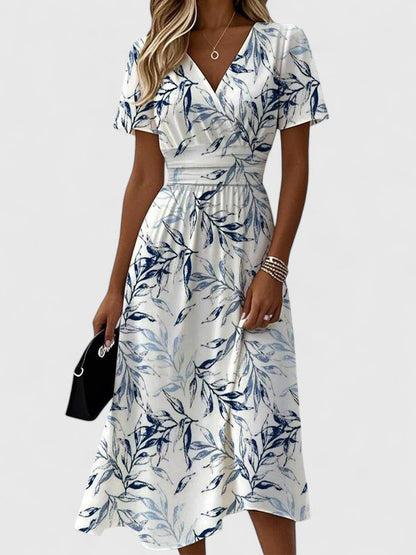 Effortless White Floral Midi Dress for Women with V Neck Flutter Sleeve Wrap Flowing Style
