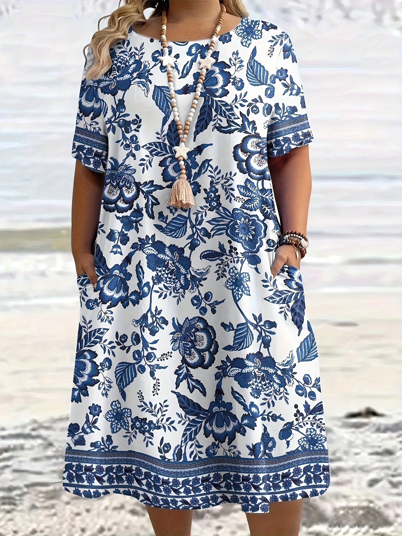 Effortless Blue Floral Midi Dress for Women with Round Neck Short Sleeve Relaxed Pocket Bohemian Style