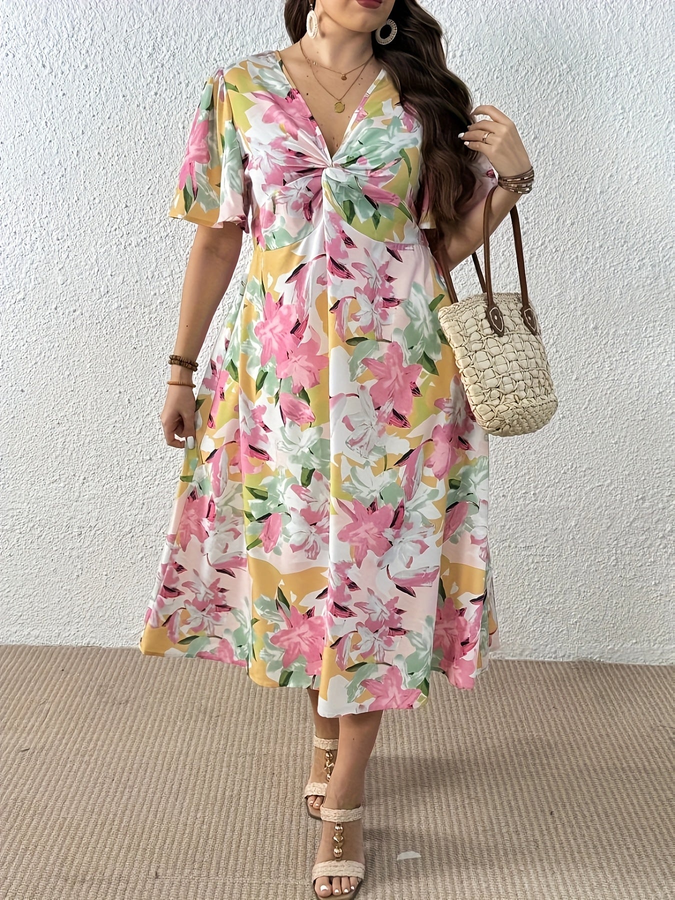 Elegant Leopard Print Midi Dress for Women with V Neck Flutter Sleeve Twist Front Flowing Style