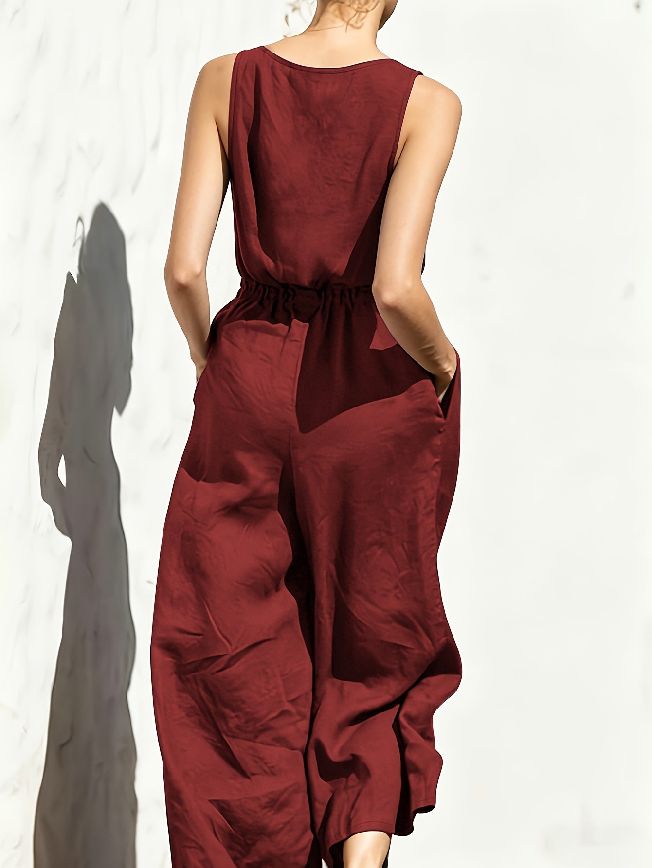 Effortless Navy Blue Linen Wide Leg Jumpsuit for Women with V Neck Sleeveless Button Front Relaxed Style