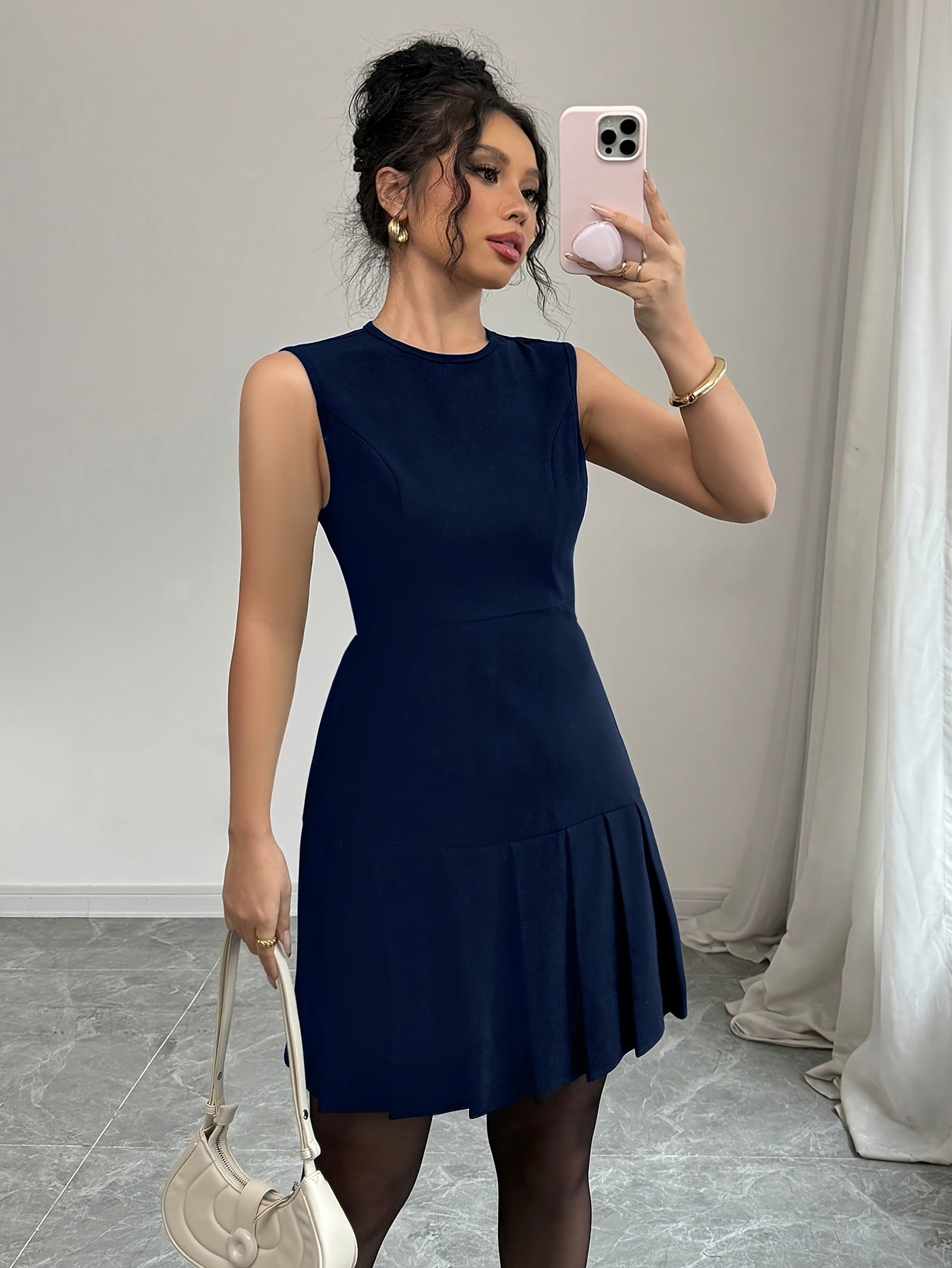 Elegant Pleated Mini Dress for Women with Round Neck Sleeveless Fit and Flare Cocktail Style