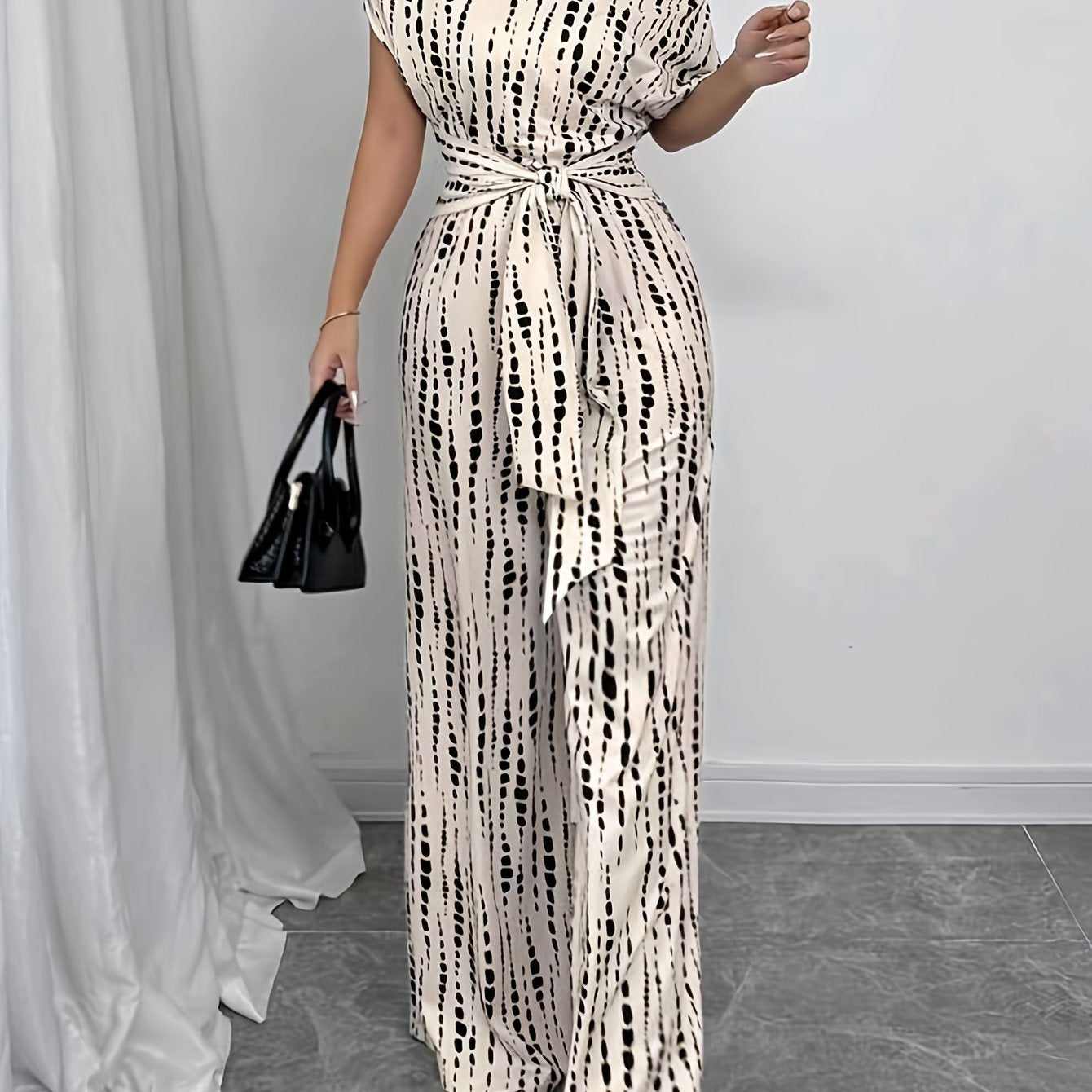 Elegant Apricot Abstract Print Jumpsuit for Women with One Shoulder Short Sleeve Wide Leg Tie Waist Style