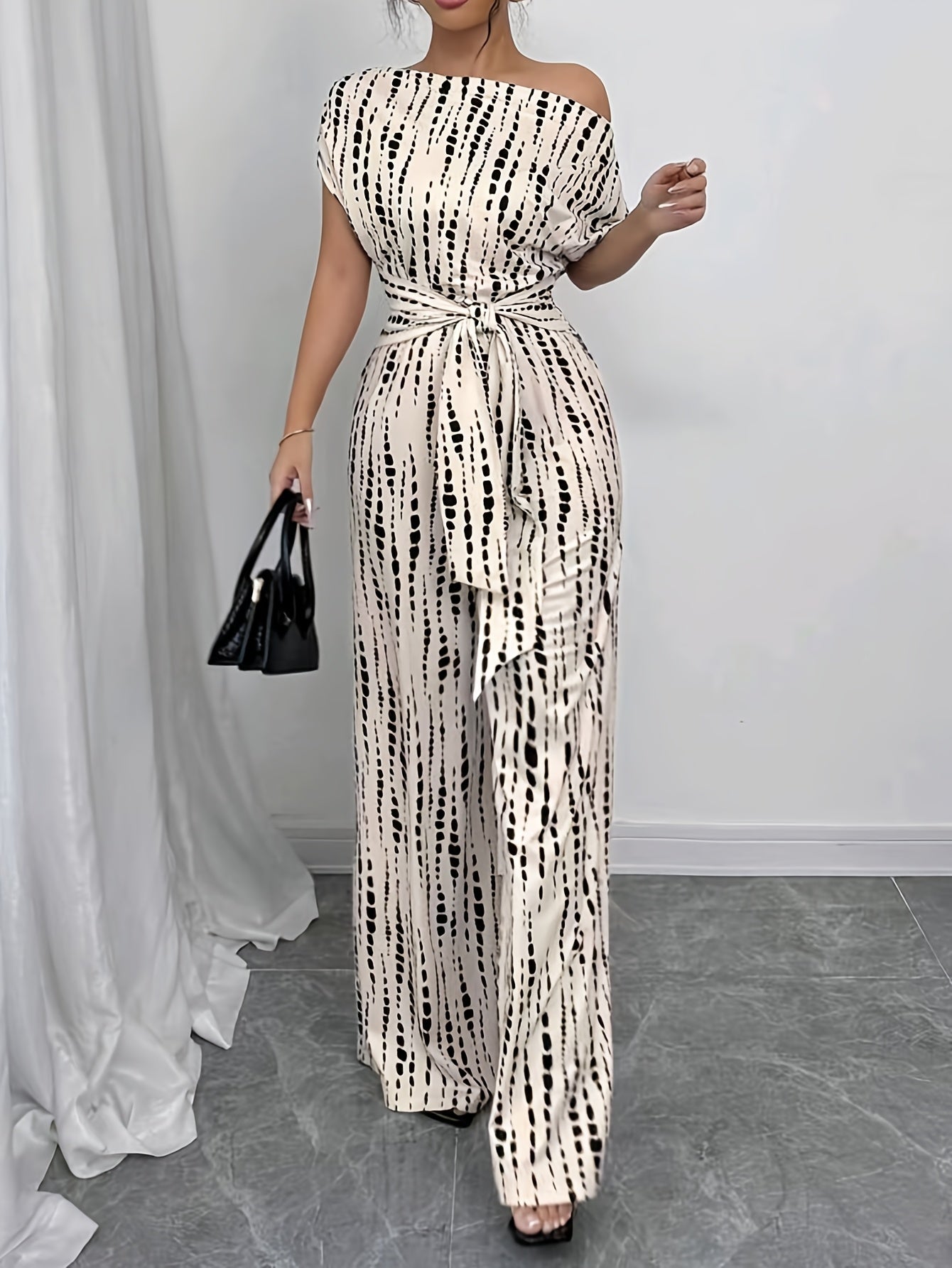 Elegant Apricot Abstract Print Jumpsuit for Women with One Shoulder Short Sleeve Wide Leg Tie Waist Style