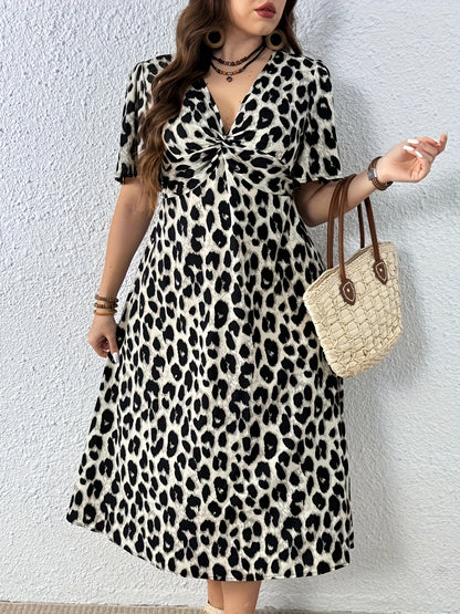 Elegant Leopard Print Midi Dress for Women with V Neck Flutter Sleeve Twist Front Flowing Style