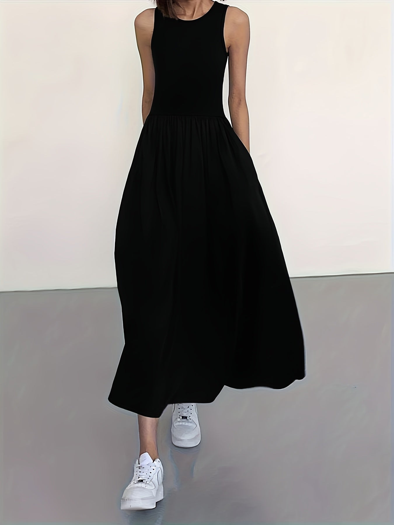 Elegant Black Maxi Dress for Women with Round Neck Sleeveless A Line Pocket Flowing Style