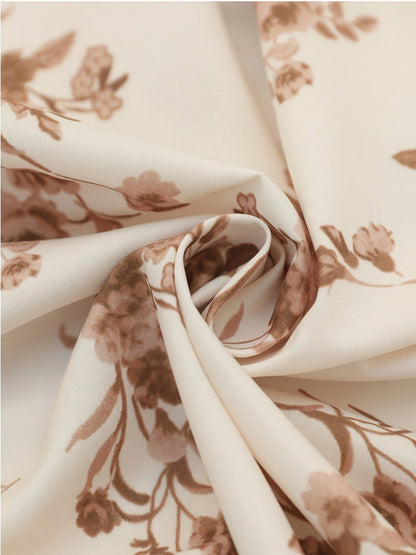 Elegant Apricot Floral Midi Dress for Women with V Neck Flutter Sleeve Wrap Ruffle Hem Style