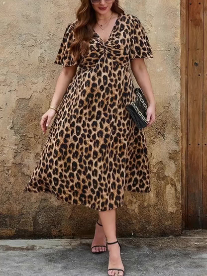 Elegant Leopard Print Midi Dress for Women with V Neck Flutter Sleeve Twist Front Flowing Style