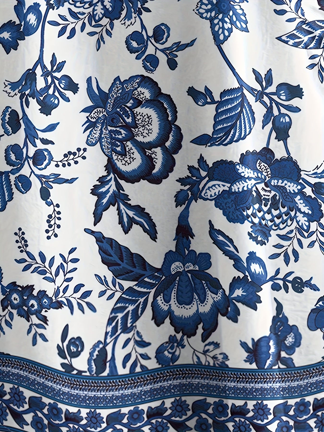Effortless Blue Floral Midi Dress for Women with Round Neck Short Sleeve Relaxed Pocket Bohemian Style
