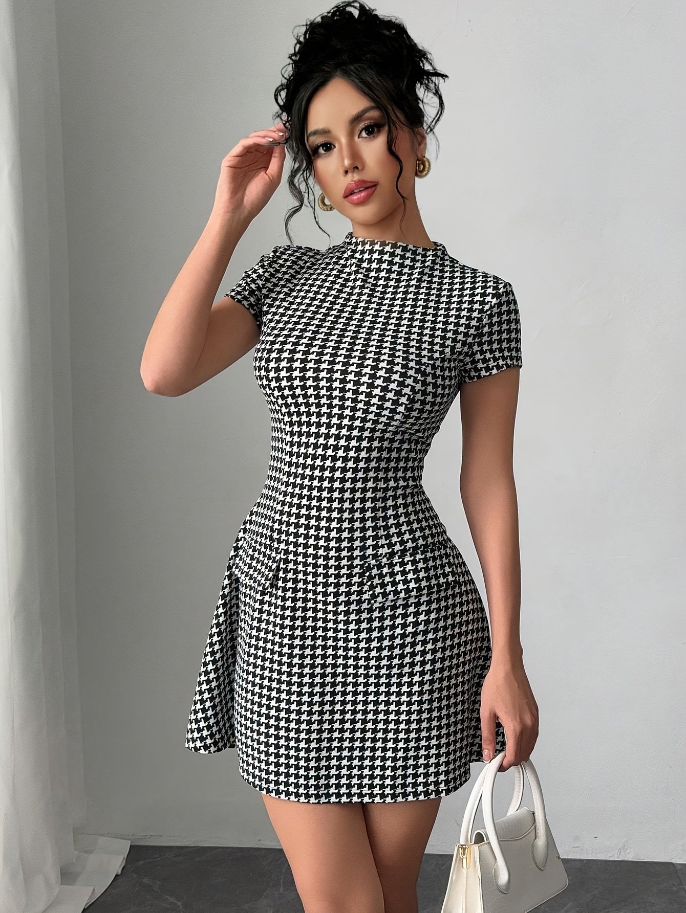 Elegant Black and White Houndstooth Mini Dress for Women with Mock Neck Short Sleeve Fit and Flare Cocktail Style