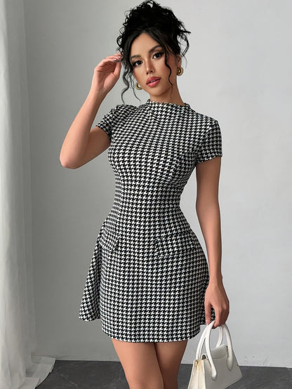 Elegant Black and White Houndstooth Mini Dress for Women with Mock Neck Short Sleeve Fit and Flare Cocktail Style