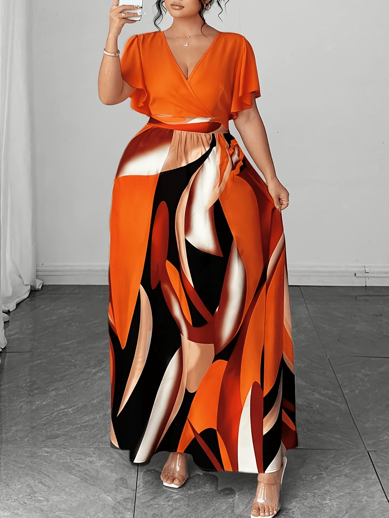 Elegant Orange Geometric Print Maxi Dress for Women with V Neck Flutter Sleeve Wrap Tie Waist Flowing Style