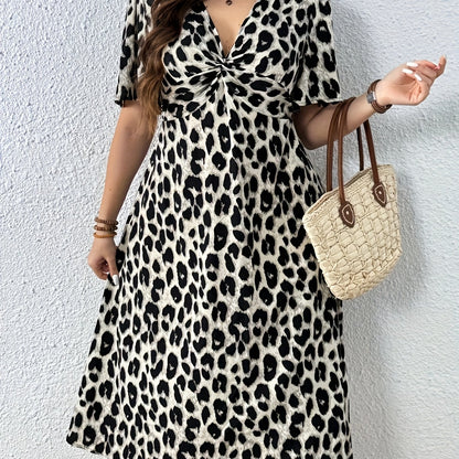 Elegant Leopard Print Midi Dress for Women with V Neck Flutter Sleeve Twist Front Flowing Style