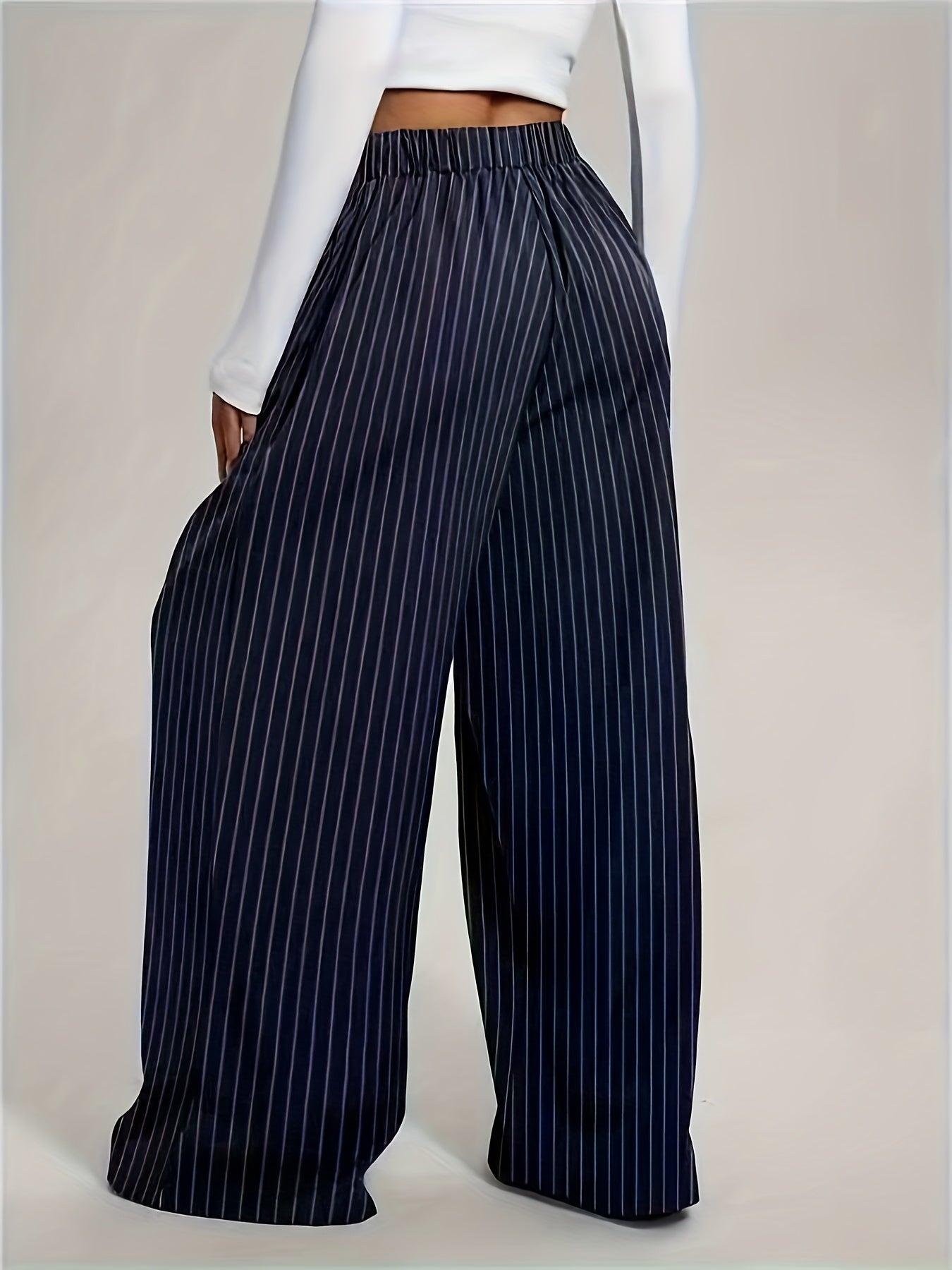 Effortless Navy Pinstripe Wide Leg Trousers for Women with High Waist Pleated Relaxed Flowing Style
