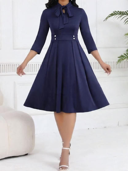Elegant Knit Midi Dress for Women with Tie Neck Elbow Sleeve Pleated Fit and Flare Style