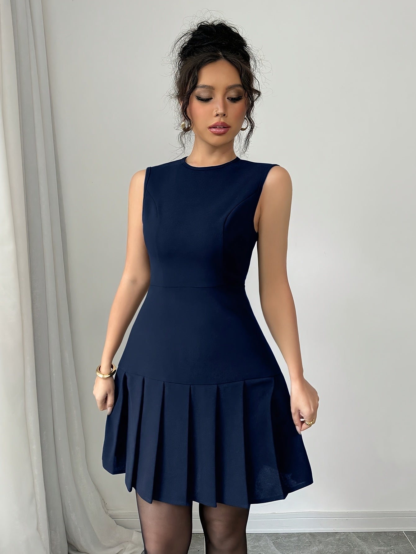 Elegant Pleated Mini Dress for Women with Round Neck Sleeveless Fit and Flare Cocktail Style
