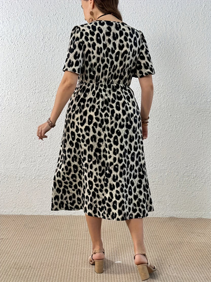 Elegant Leopard Print Midi Dress for Women with V Neck Flutter Sleeve Twist Front Flowing Style