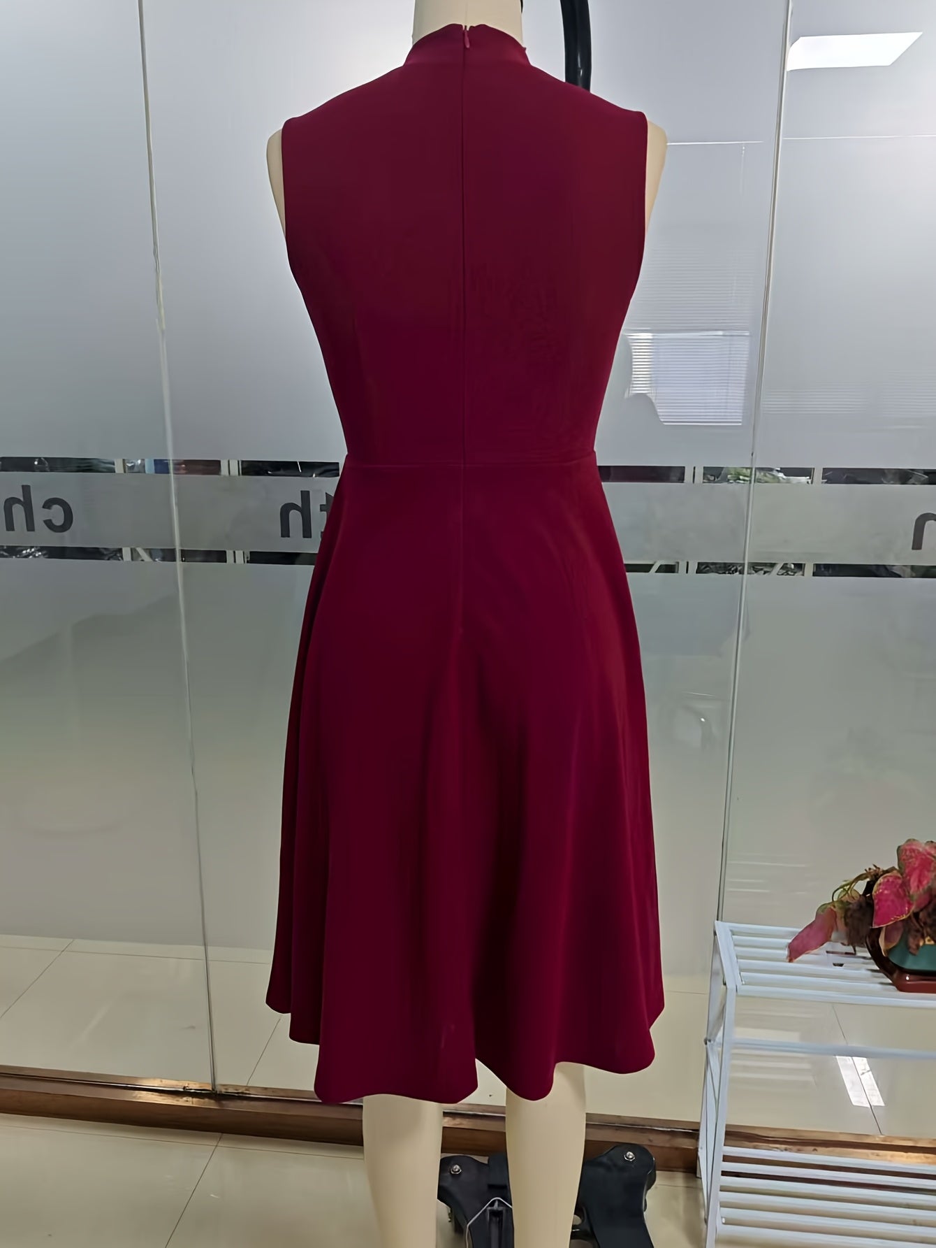 Elegant Navy Fit and Flare Dress for Women with Mock Neck Sleeveless Button Front Vintage Style